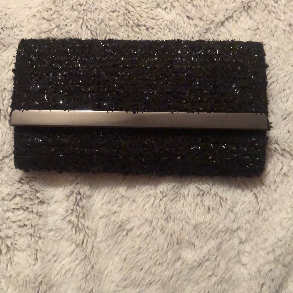 Black clutch , came with a gift set